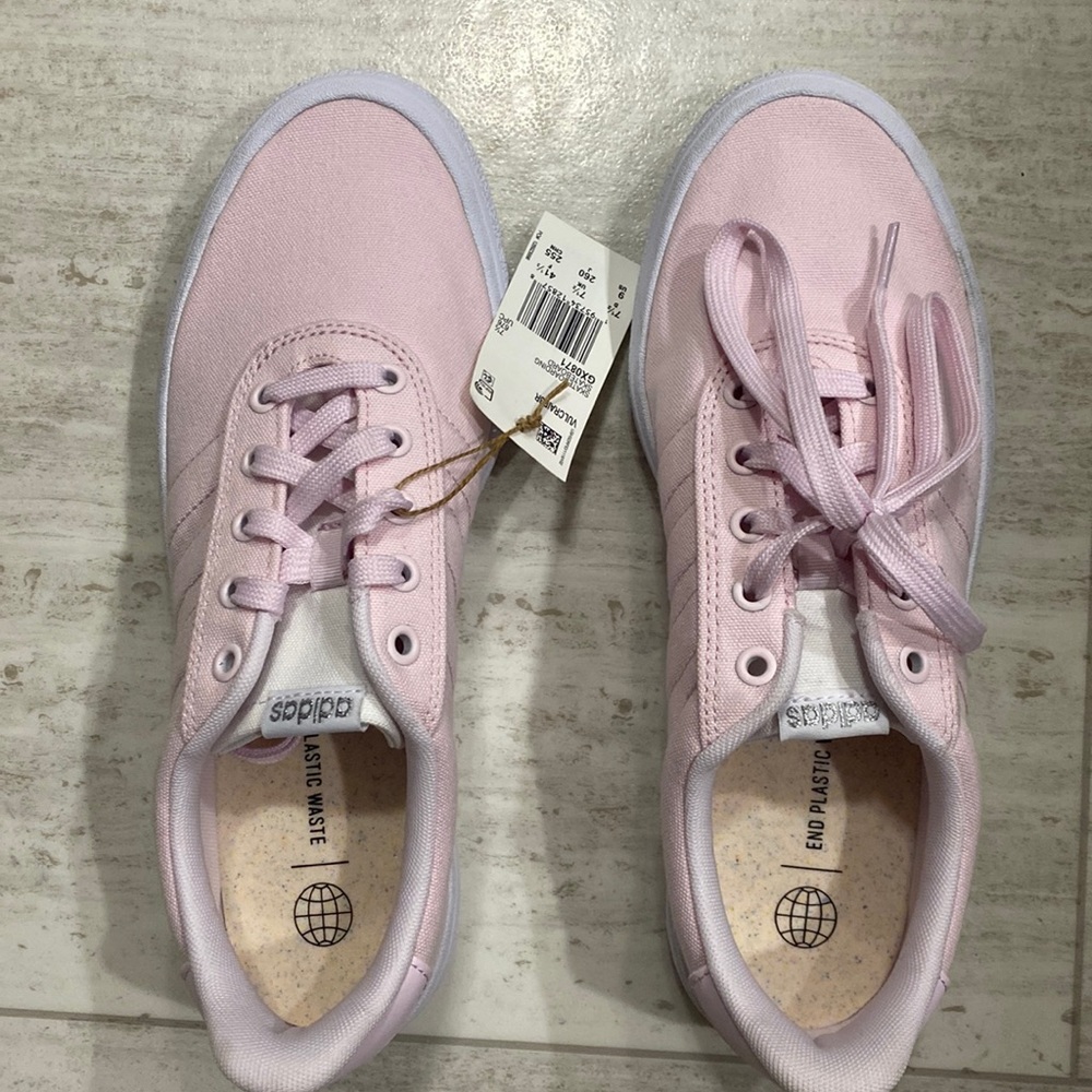 Woman’s size 9 adidas pink skateboard shoes never worn and still have tag.